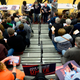 Caucus goers are handed their first-choice cards during caucusing at Abraham Lincoln High School in Des Moines, Iowa, on February 3, 2020.